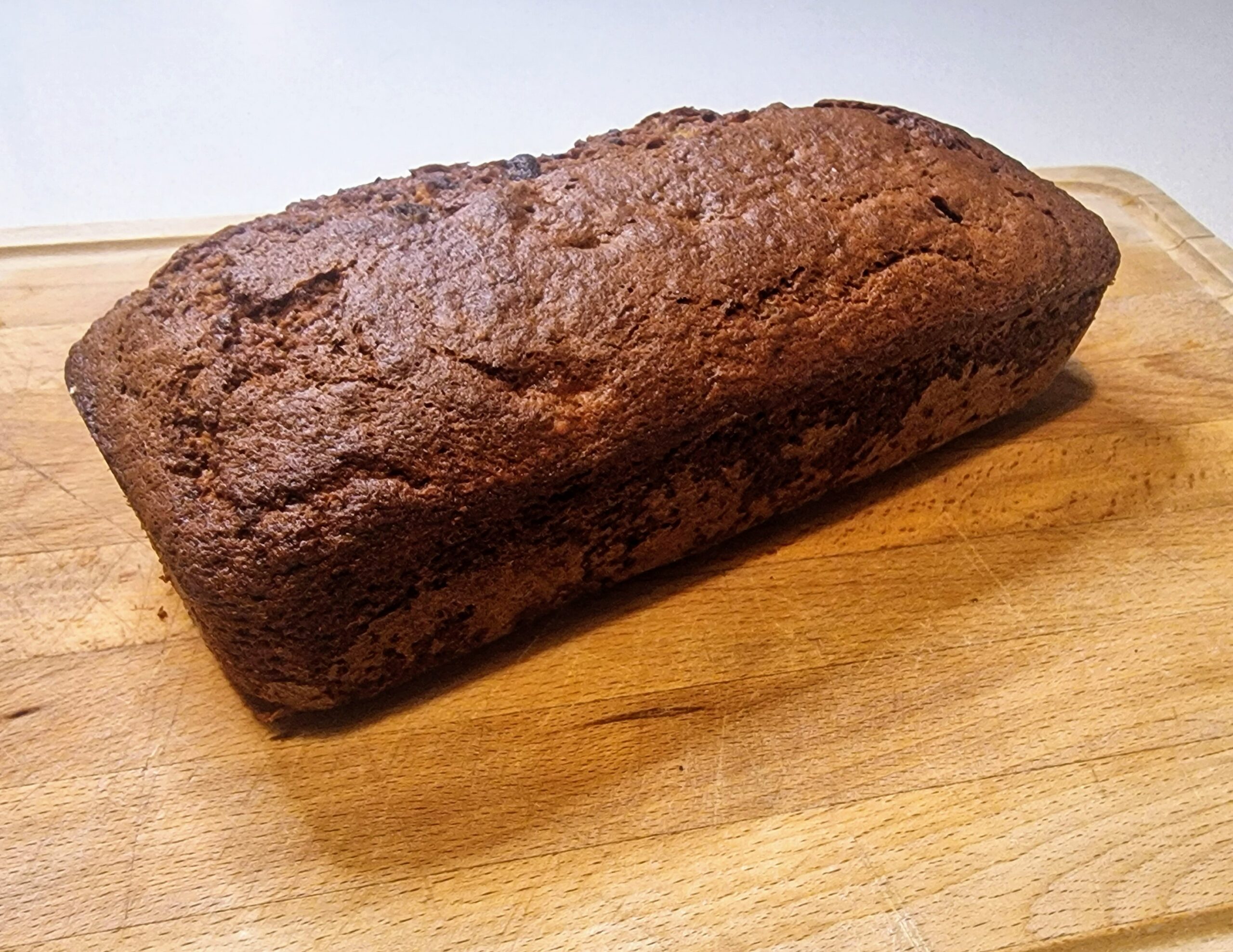 banana bread on wooden board