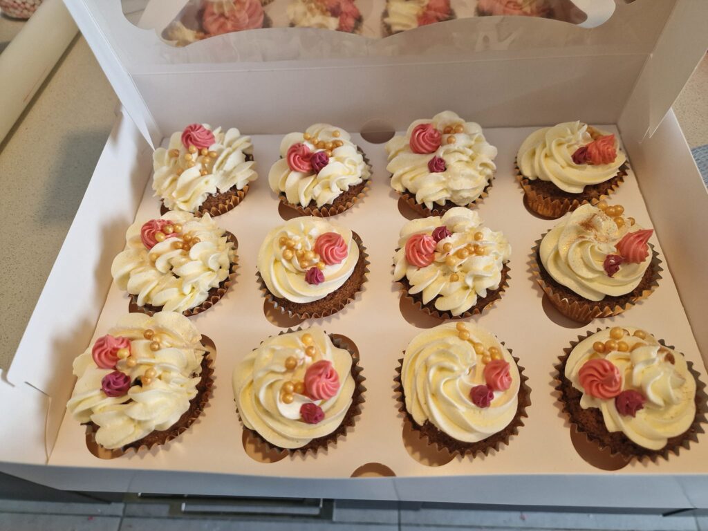 vanilla cupcakes decorated with buttercream